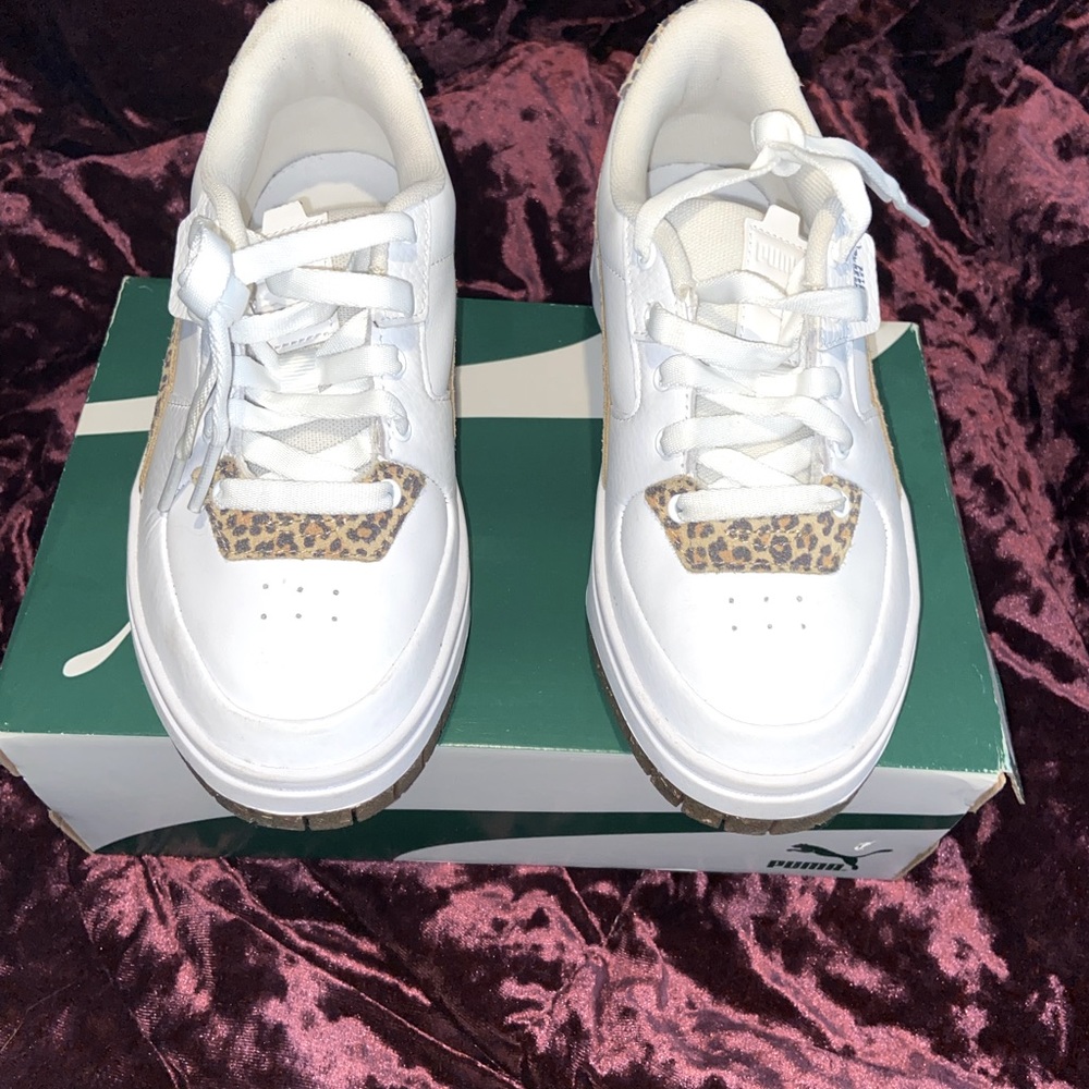 Leopard print pumas